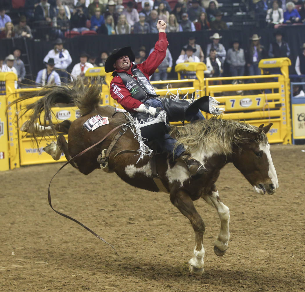Steven Dent competes in the bareback riding event during the second night of the National Finals Rodeo at the Thomas & Mack Center in Las Vegas on Friday, Dec. 8, 2017. Chase Stevens Las Vegas ...